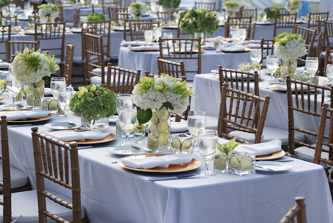 Formal event table settings with linens and tabletop rentals